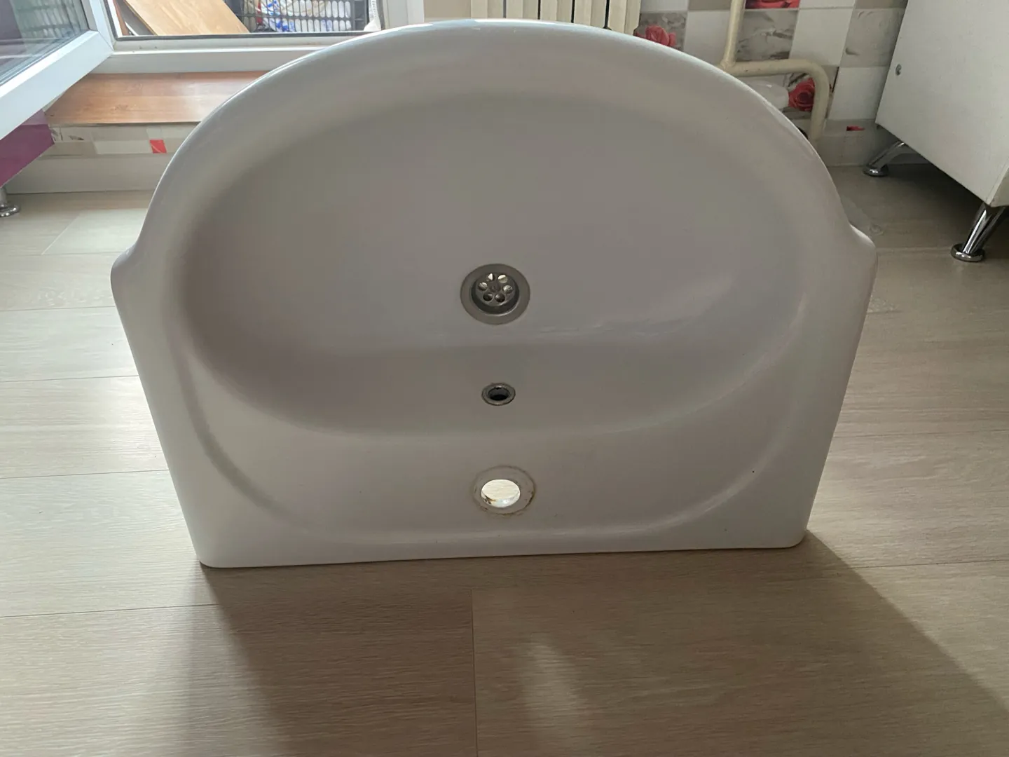 Раковина керамическая